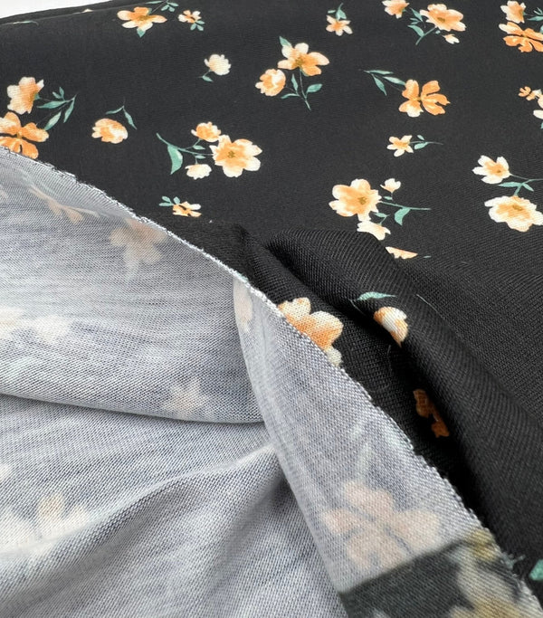 Black Orange Ditsy Floral Print Soft Spun Poly Stretch Fabric