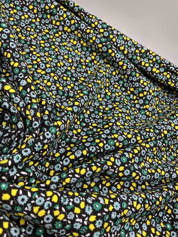 Ditsy Green & Yellow On Black Floral Print Viscose Elastane Fabric