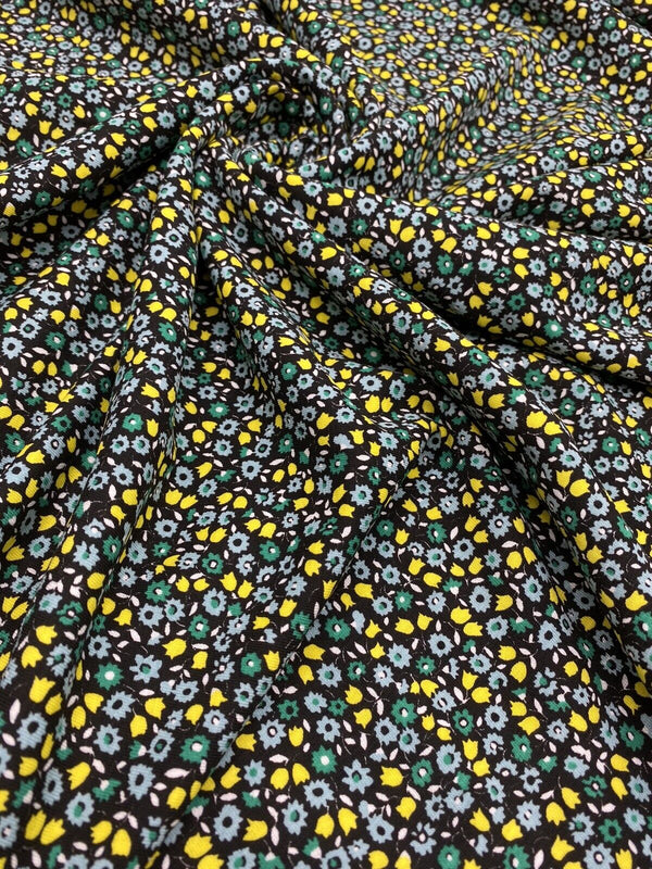 Ditsy Green & Yellow On Black Floral Print Viscose Elastane Fabric
