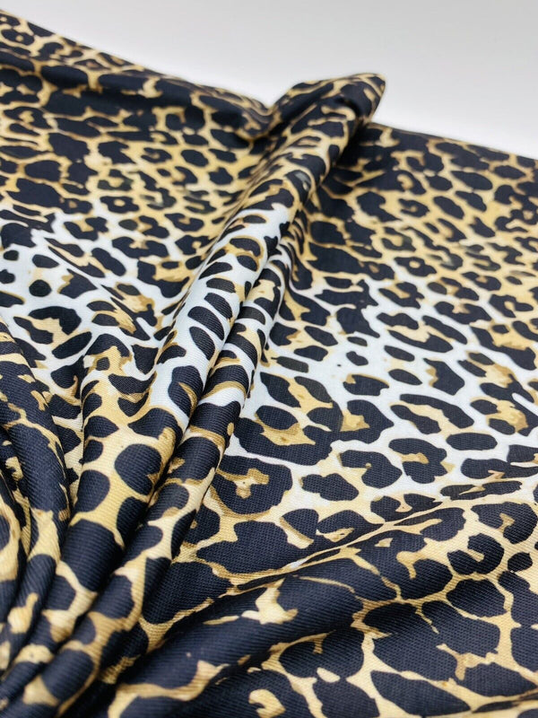 Leopard White Print Spun Poly Stretch Fabric