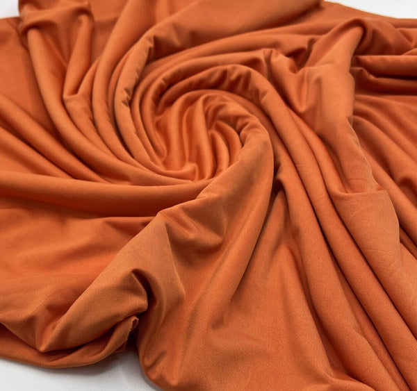 Orange Plain Shiny Soft Touch Slinky 4 Way Stretch Fabric