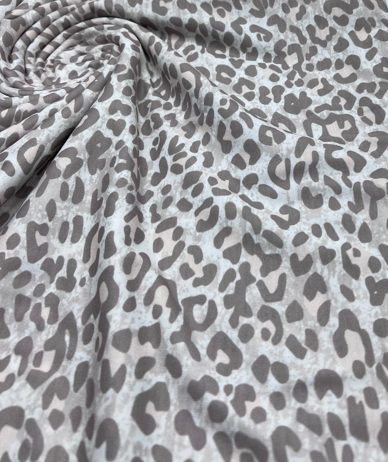 Pale Fade Animal Print Spun Poly Stretch Fabric