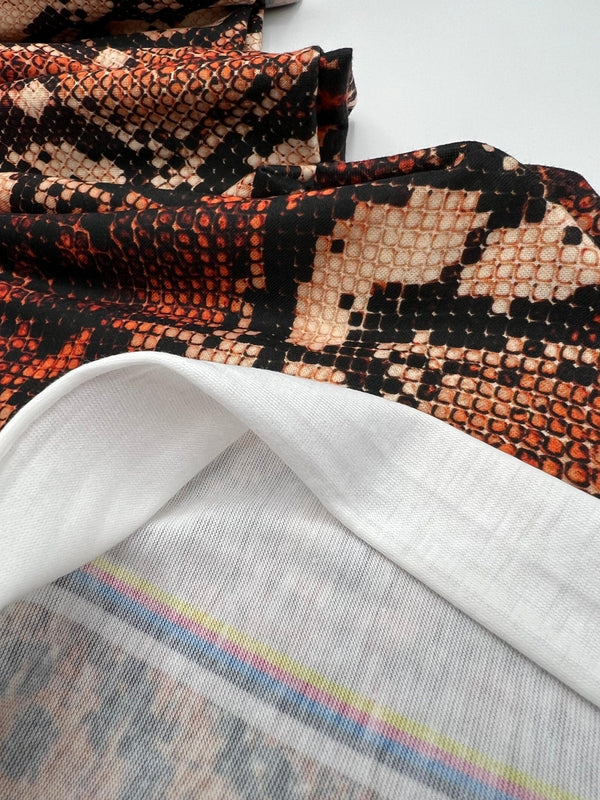 Rust Snake Print Spun Poly Stretch Fabric