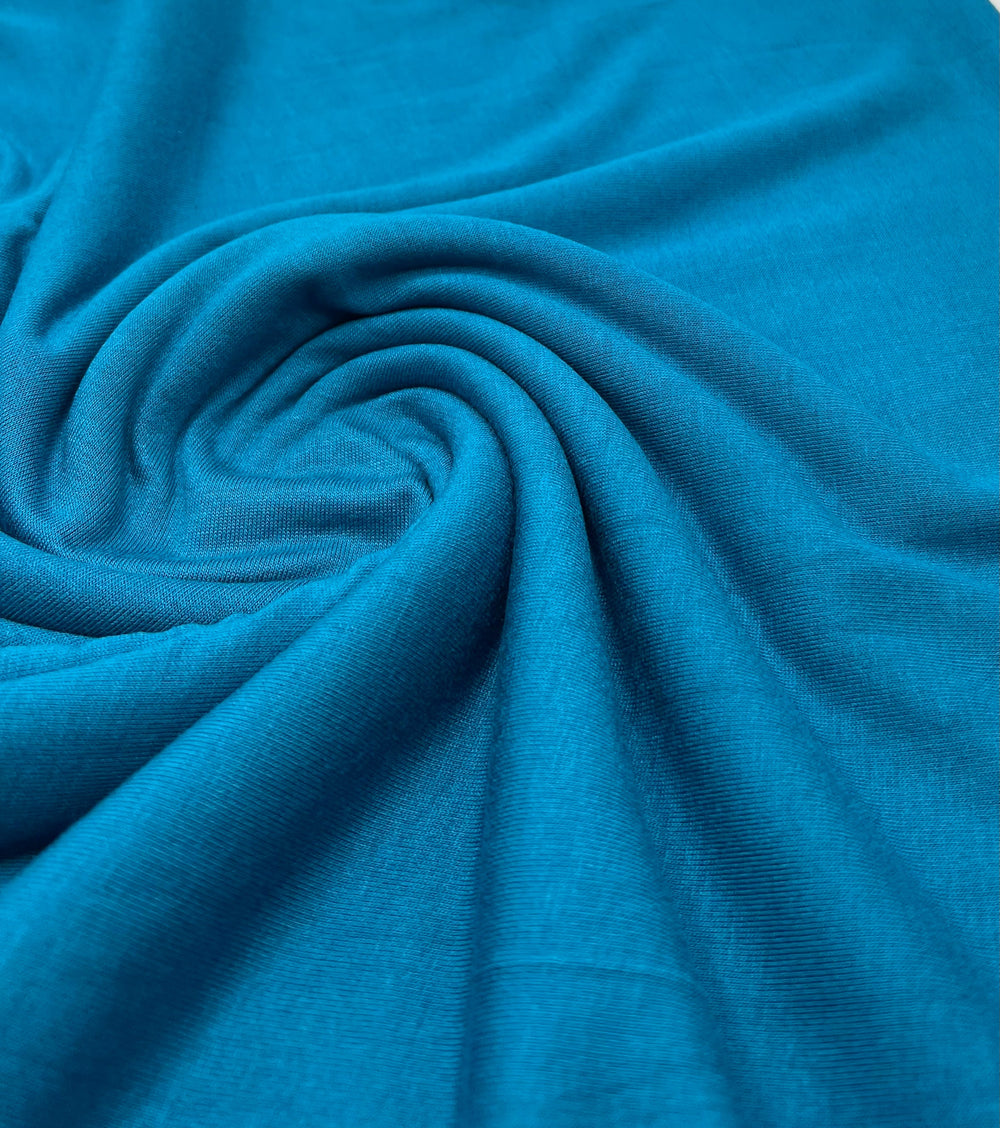 Plain Teal Blue Viscose Elastane Fabric 4 Way Stretch Jersey