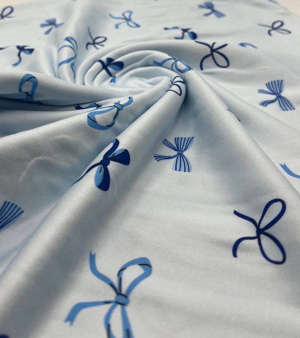 Baby Blue Bow Super Soft Print Spun Poly Stretch Fabric