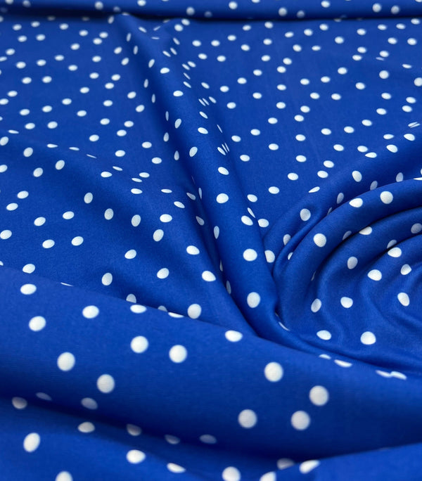 Blue Polka Stretch Jersey 220GSM 4 Way Stretch Fabric