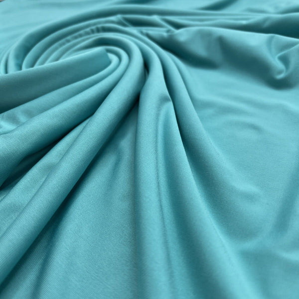 Aqua Blue Plain Shiny Soft Touch Slinky 4 Way Stretch Fabric