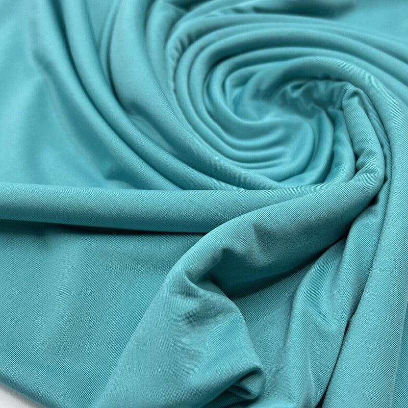 Aqua Blue Plain Shiny Soft Touch Slinky 4 Way Stretch Fabric