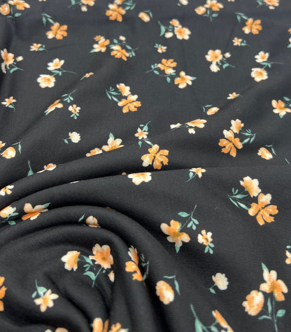 Black Orange Ditsy Floral Print Soft Spun Poly Stretch Fabric