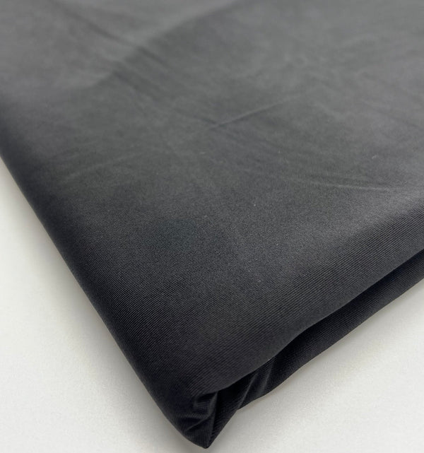 Black Plain Shiny Soft Touch Slinky 4 Way Stretch Fabric