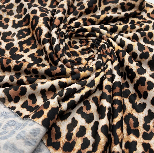 Black Tan Animal Print Spun Poly Stretch Fabric