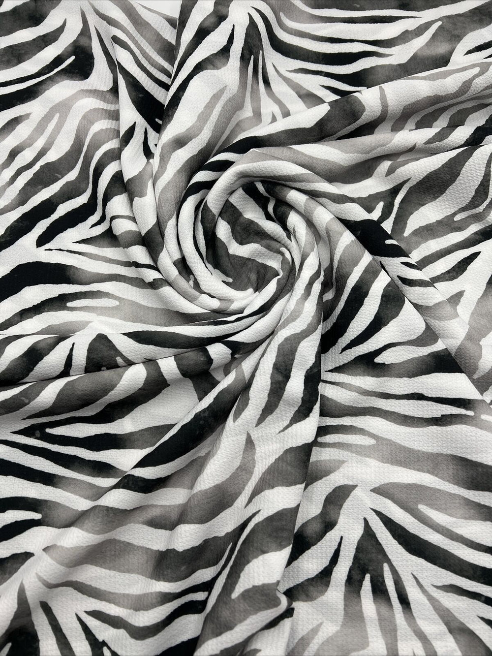 Black Zebra Print Lightweight Bubble Crepe Non Stretch Fabric