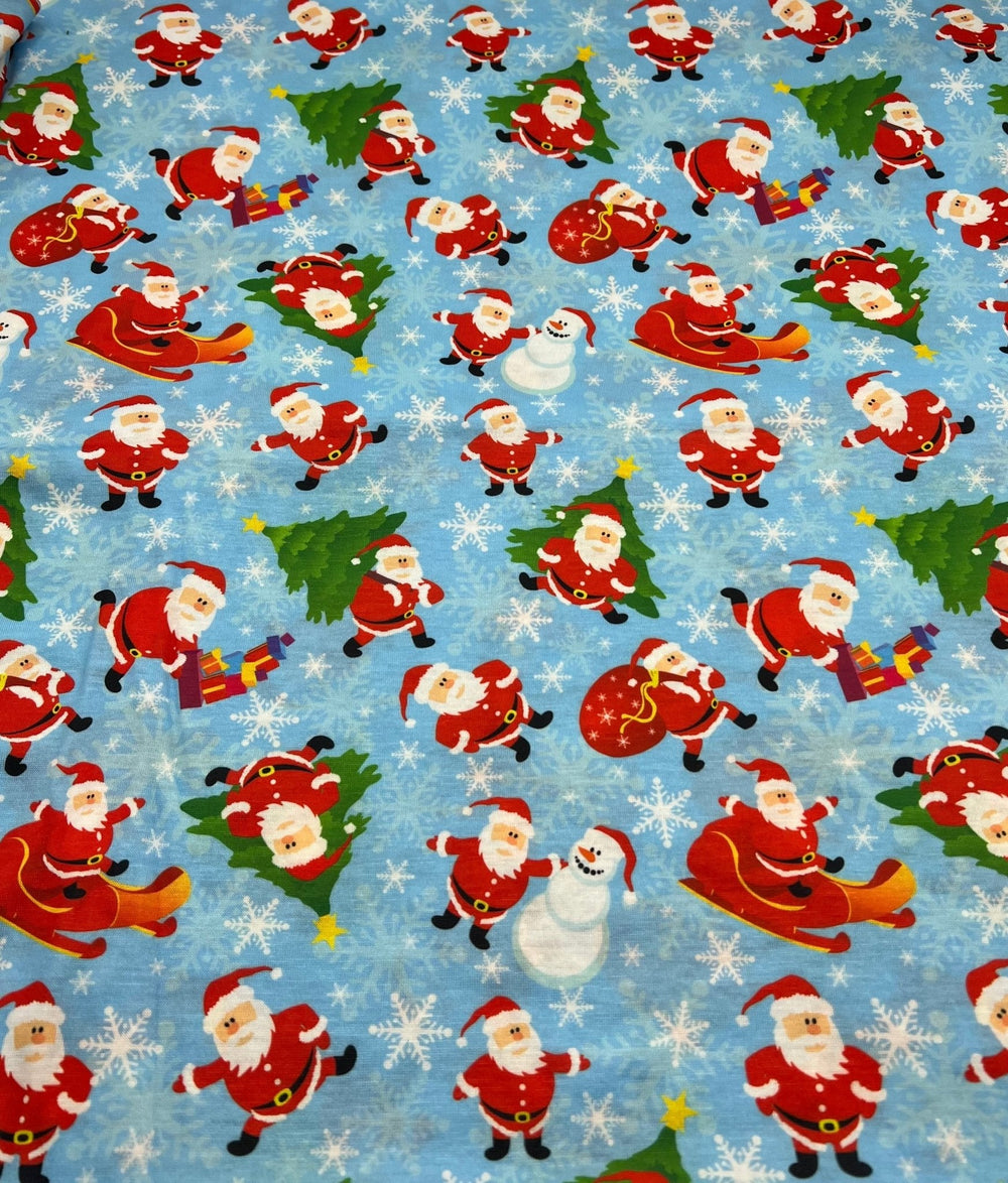 Blue Santa Sledge Print Soft Spun Poly Stretch Fabric