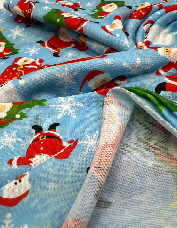 Blue Santa Sledge Print Soft Spun Poly Stretch Fabric