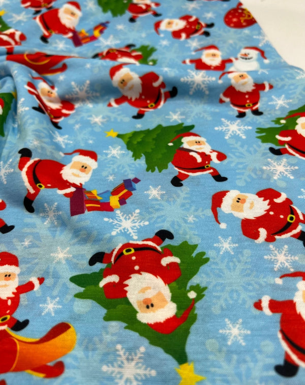 Blue Santa Sledge Print Soft Spun Poly Stretch Fabric
