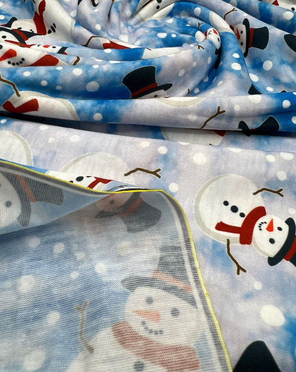 Blue Snow Snowman Print Soft Spun Poly Stretch Fabric
