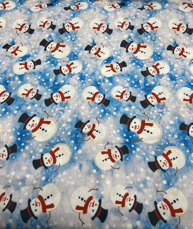 Blue Snow Snowman Print Soft Spun Poly Stretch Fabric