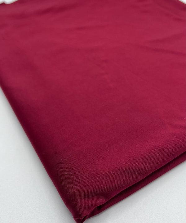 Burgundy Plain Shiny Soft Touch Slinky 4 Way Stretch Fabric