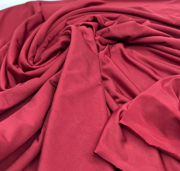 Burgundy Plain Shiny Soft Touch Slinky 4 Way Stretch Fabric