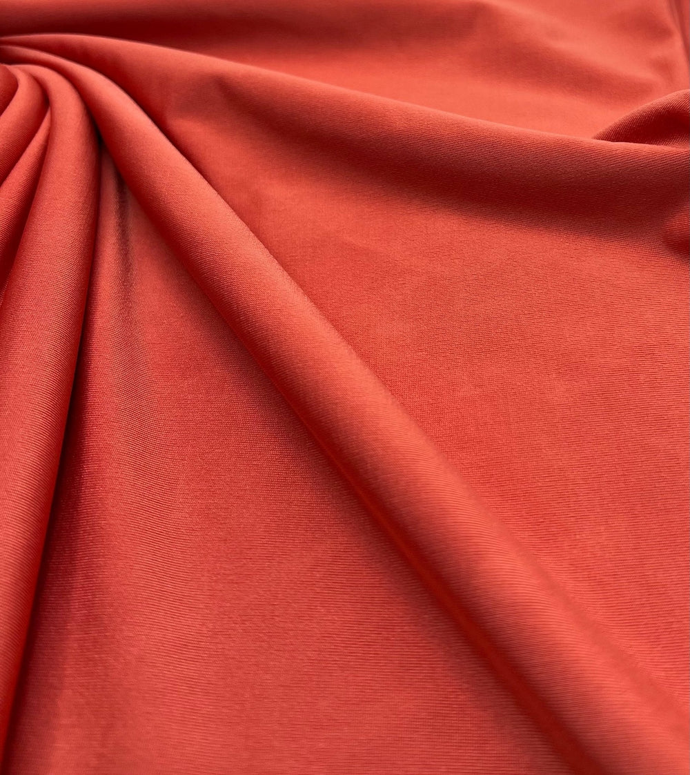 Dark Orange Plain Shiny Soft Touch Slinky 4 Way Stretch Fabric