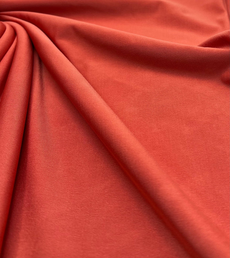 Dark Orange Plain Shiny Soft Touch Slinky 4 Way Stretch Fabric