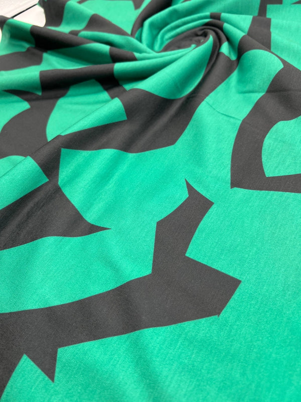Green Black Spun Poly Stretch Fabric