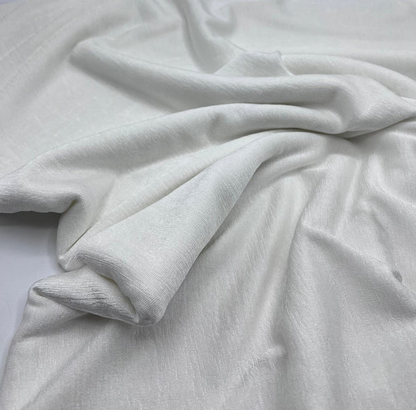 Ivory Acetate Slinky 4 Way Stretch Fabric