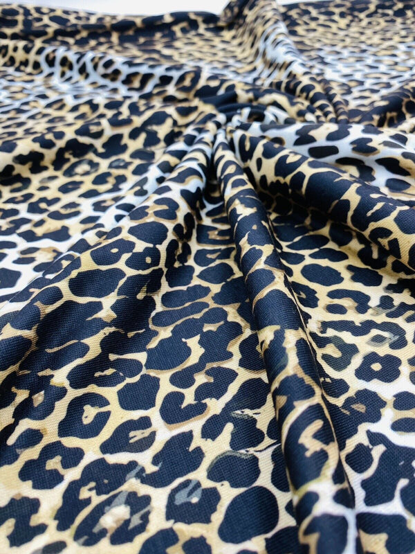 Leopard White Print Spun Poly Stretch Fabric