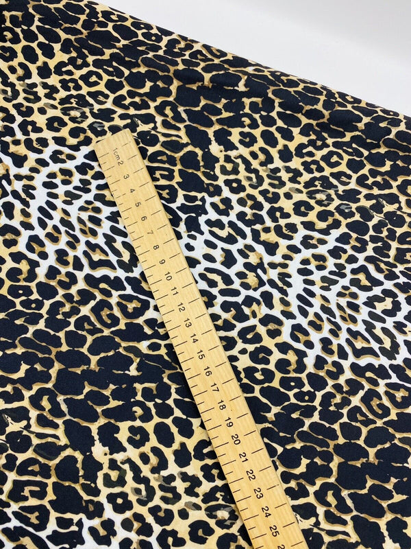 Leopard White Print Spun Poly Stretch Fabric