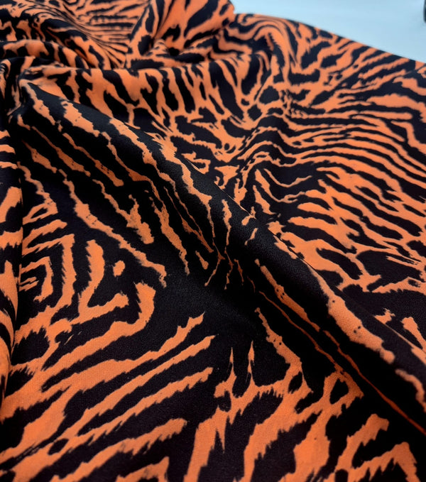 Orange Animal Neon Back Printed Scuba Crepe Fabric 4 Way Stretch