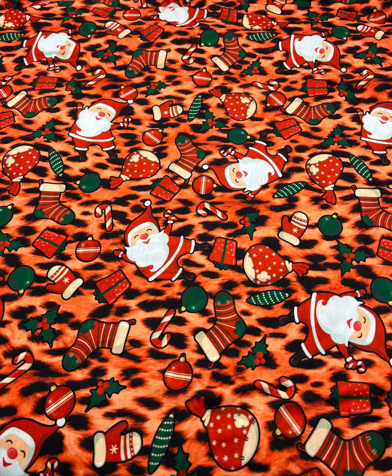 Orange Animal Santa Print Soft Spun Poly Stretch Fabric