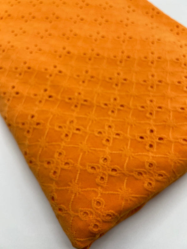 Orange Broderie Anglaise Stretch Fabric 4 Way Stretch Fabric