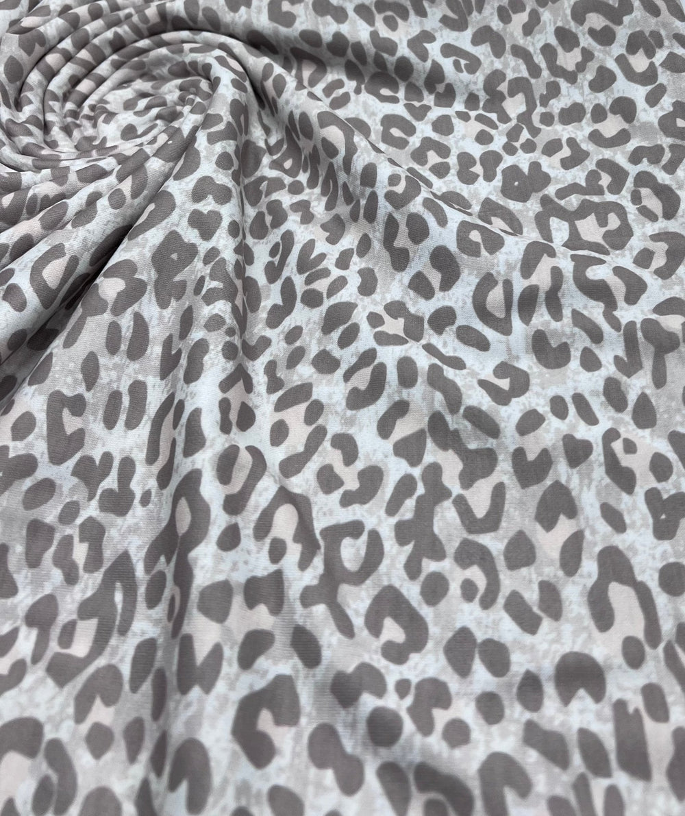Pale Fade Animal Print Spun Poly Stretch Fabric