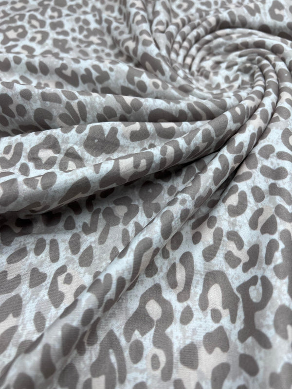 Pale Fade Animal Print Spun Poly Stretch Fabric