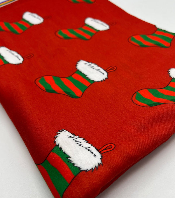 Red Stocking Print Soft Spun Poly Stretch Fabric
