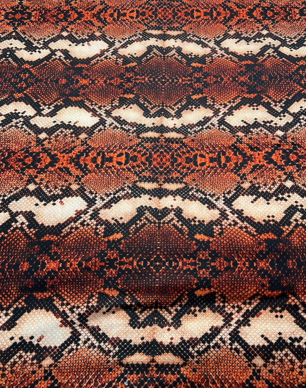 Rust Snake Print Spun Poly Stretch Fabric