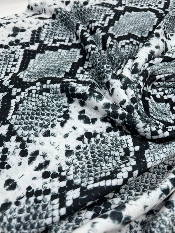 Silver Grey Snake Print Spun Poly Stretch Fabric