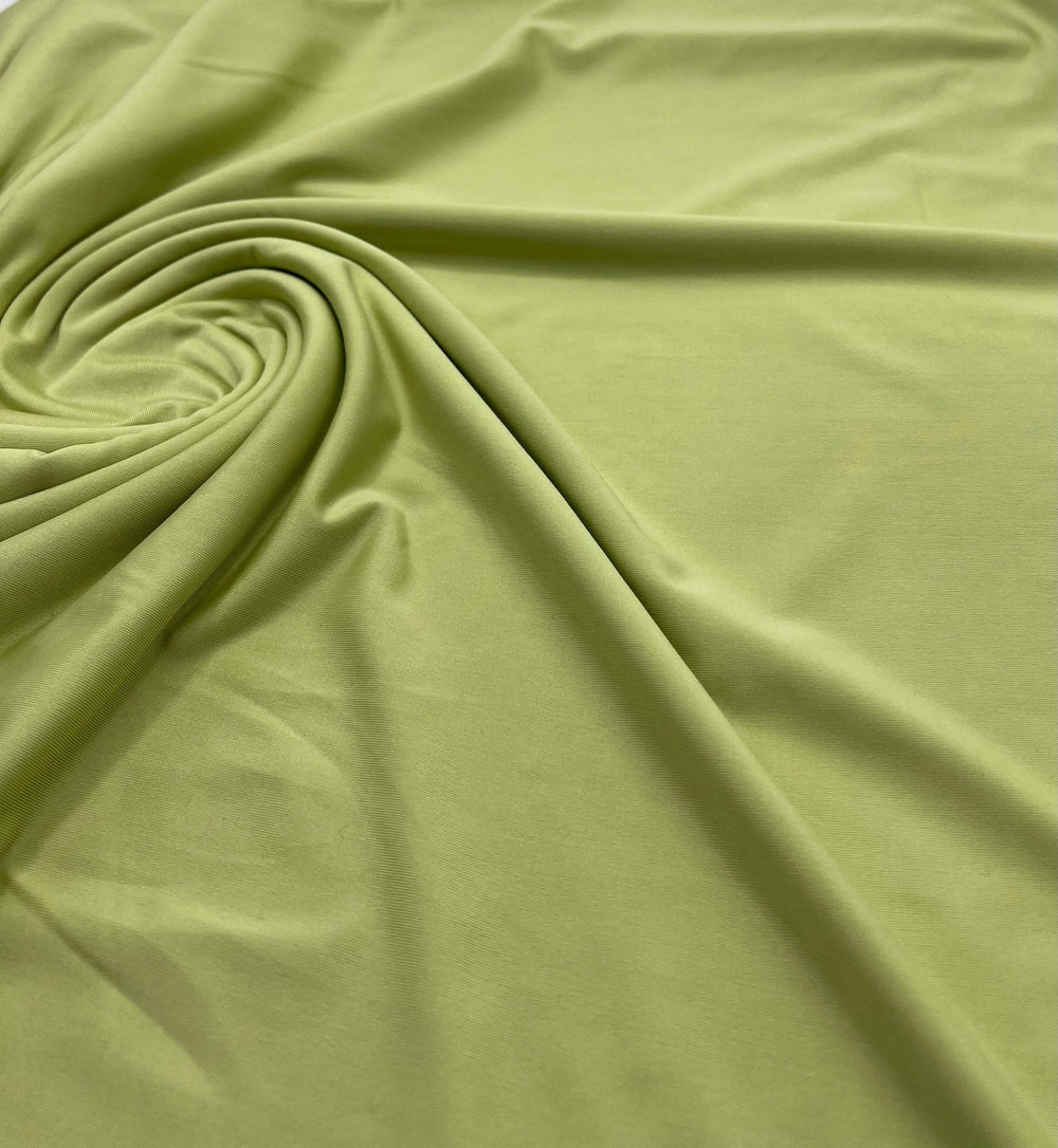 Soft Lime Green Plain Shiny Soft Touch Slinky 4 Way Stretch Fabric