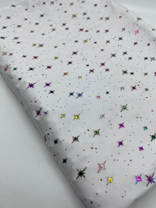White Multi Star Soft Spun Poly Stretch Fabric